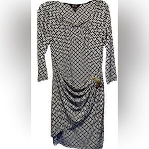 Cute and comfortable Thalia Sodi dress. Navy and White with gold embellishments.